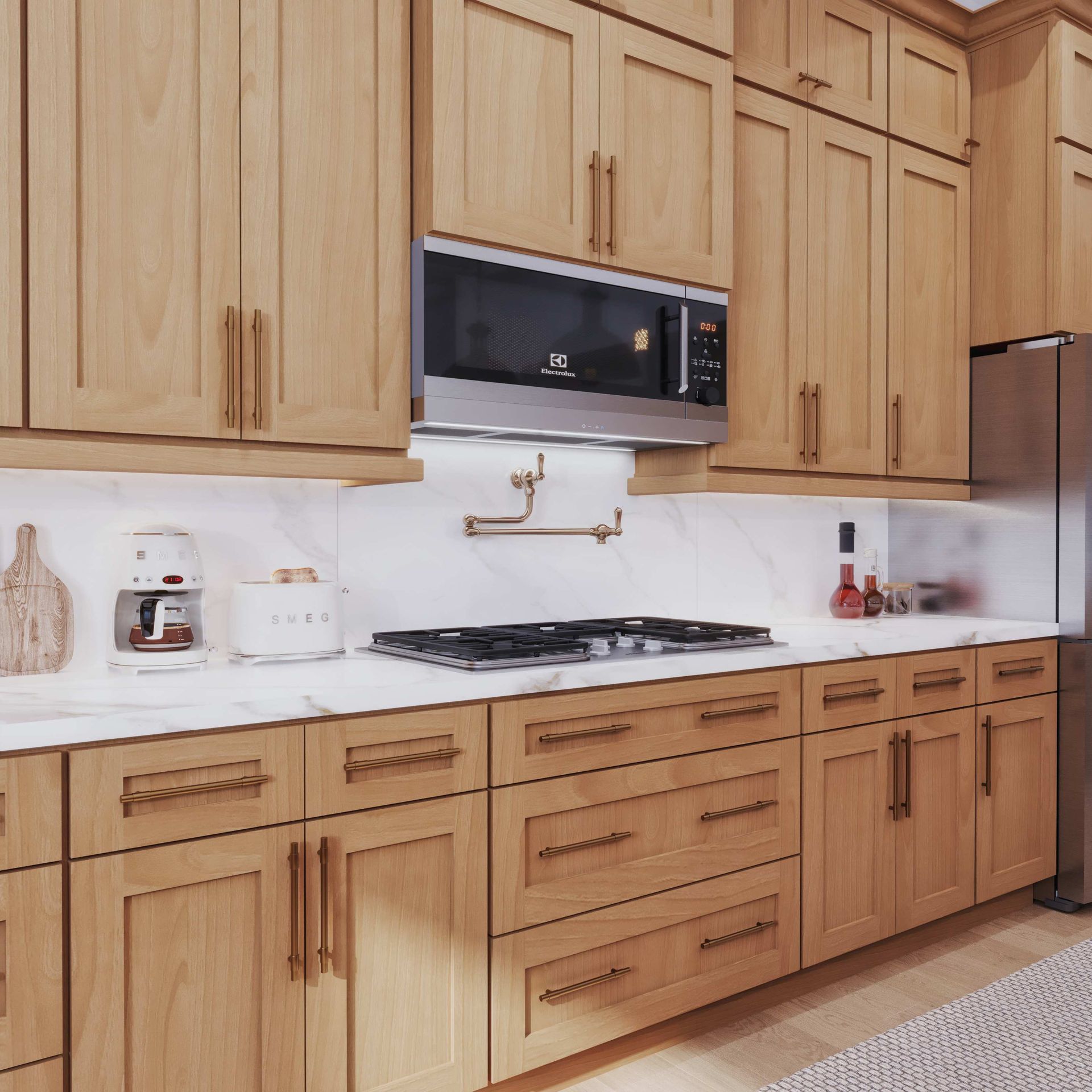 Modern coastal kitchen featuring Havana Treasure Shaker cabinets with golden blonde finish.