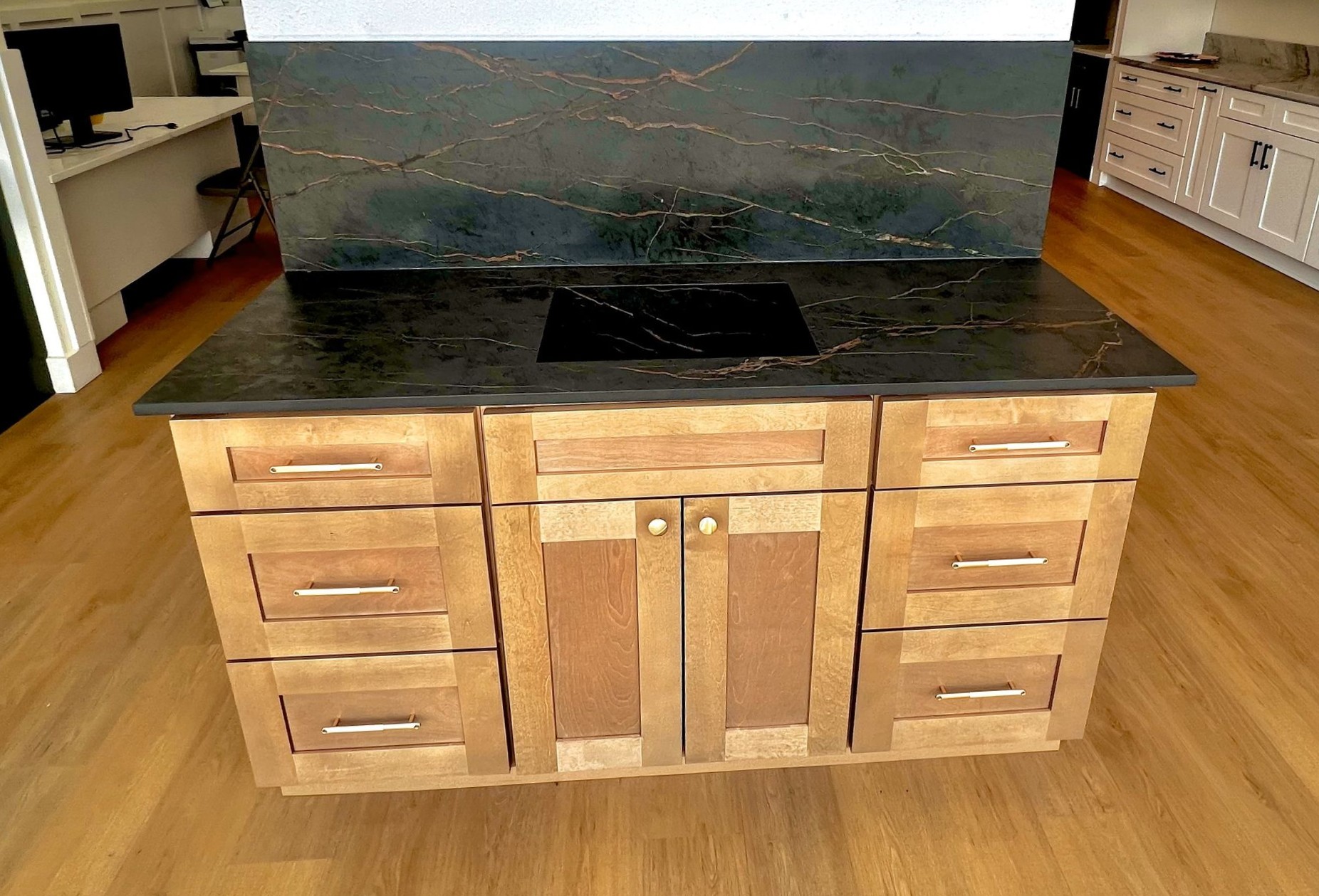 Havana Treasure Shaker kitchen island with white quartz countertops and warm wood cabinetry