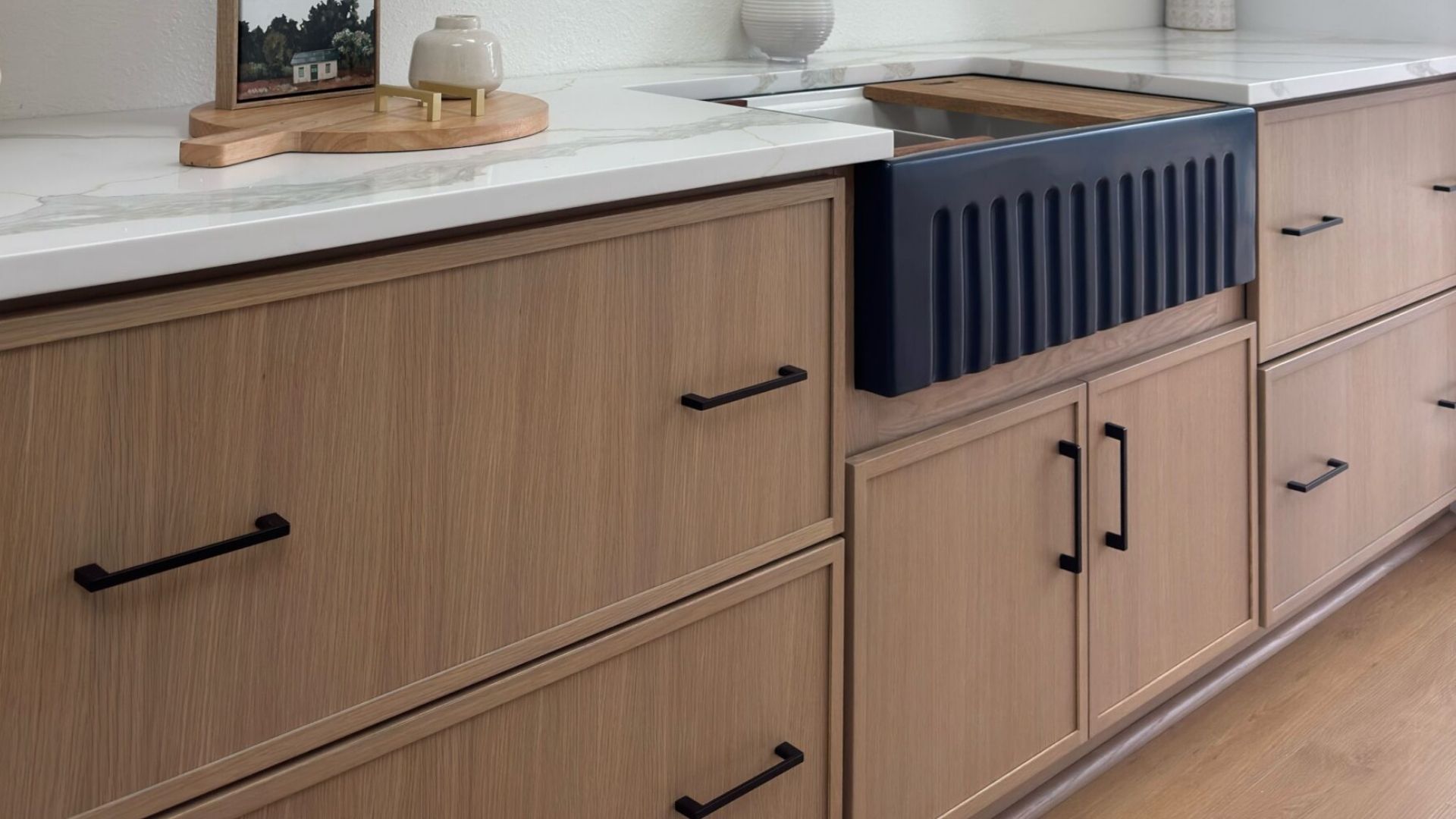 Modern white oak RTA kitchen cabinets with soft-close hardware detail