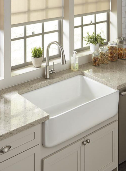 White Fireclay farmhouse sink installed with Havana Treasure Shaker cabinetry.